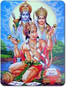 Apguden Hanuman. I bakgrunden guden Rama med gemålen Sita, med vars öden Hanuman är förknippad. Detta skildras i eposet Ramayana. Kungakronan och spiran symboliserar kraft och mod.